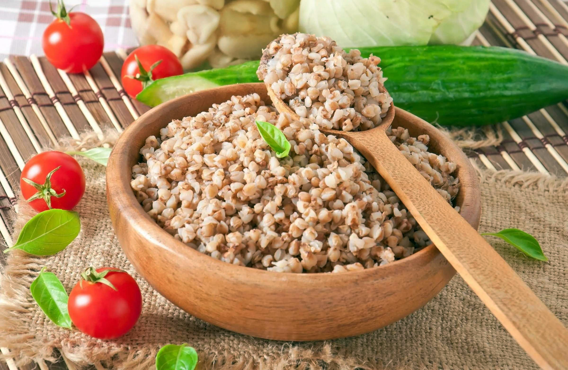 Buckwheat porridge with fresh vegetables in the buckwheat diet menu for weight loss